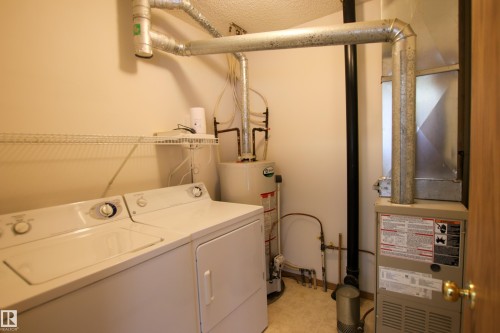 #408 610 King St, Spruce Grove, AB - Indoor Photo Showing Laundry Room