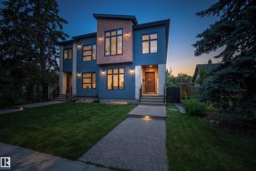 Modern exterior with a flat roofline, brick and stucco accents, and black-framed windows - 11018 122 Street Nw, Edmonton, AB - Outdoor With Facade