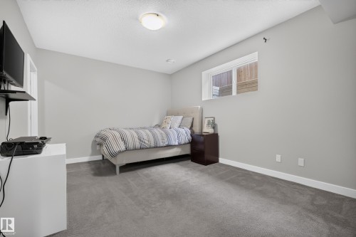 Recessed lighting, light gray wall paint, gray carpet flooring, white trim, and a built-in window - 11018 122 Street Nw, Edmonton, AB - Indoor Photo Showing Other Room