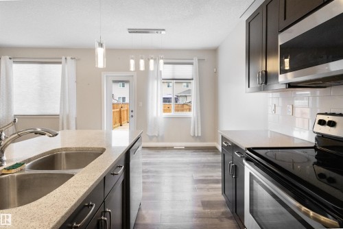 37 Roseberry Lane, Fort Saskatchewan, AB - Indoor Photo Showing Kitchen With Double Sink