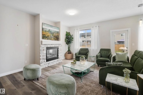 37 Roseberry Lane, Fort Saskatchewan, AB - Indoor Photo Showing Living Room With Fireplace