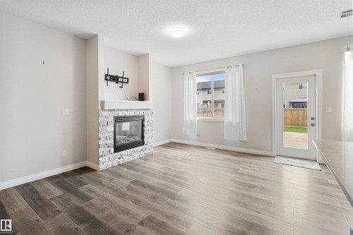 37 Roseberry Lane, Fort Saskatchewan, AB - Indoor Photo Showing Living Room With Fireplace