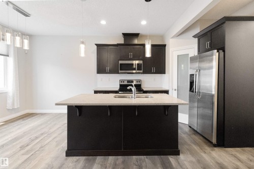 37 Roseberry Lane, Fort Saskatchewan, AB - Indoor Photo Showing Kitchen With Stainless Steel Kitchen With Double Sink