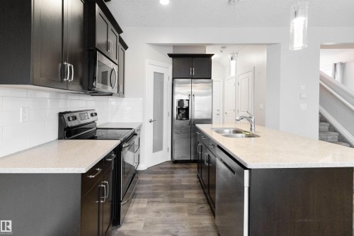 37 Roseberry Lane, Fort Saskatchewan, AB - Indoor Photo Showing Kitchen With Stainless Steel Kitchen With Double Sink With Upgraded Kitchen