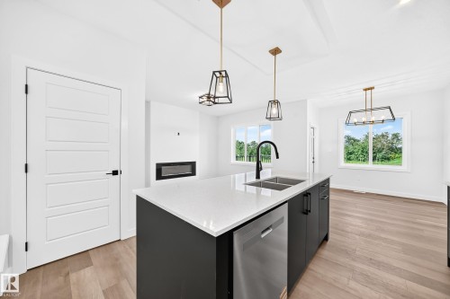 104 Waverly Way, Fort Saskatchewan, AB - Indoor Photo Showing Kitchen With Double Sink With Upgraded Kitchen
