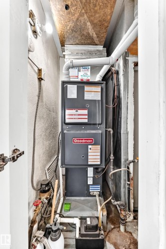 Goodman furnace unit with ductwork - 10524 128 Avenue Nw, Edmonton, AB - Indoor Photo Showing Basement