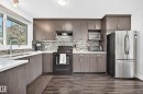 2112 36 Street Nw, Edmonton, AB  - Indoor Photo Showing Kitchen With Double Sink With Upgraded Kitchen 