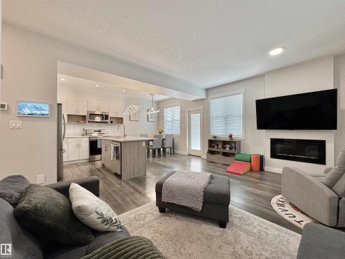 127 Richmond Link, Fort Saskatchewan, AB - Indoor Photo Showing Living Room With Fireplace