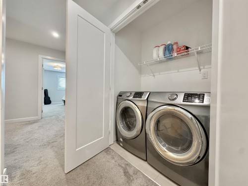 Upper Level - 127 Richmond Link, Fort Saskatchewan, AB - Indoor Photo Showing Laundry Room