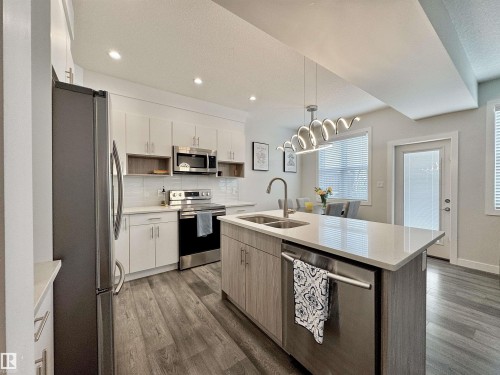 127 Richmond Link, Fort Saskatchewan, AB - Indoor Photo Showing Kitchen With Double Sink With Upgraded Kitchen