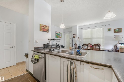 #2-208 4245 139 Av Nw, Edmonton, AB - Indoor Photo Showing Kitchen With Double Sink