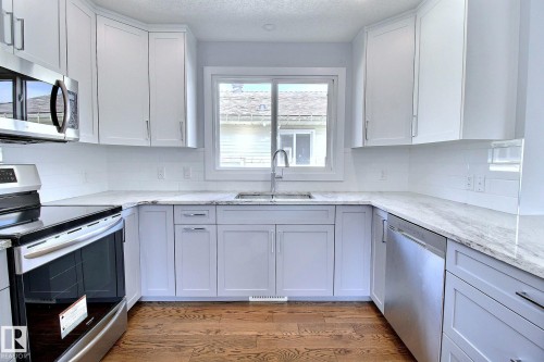 14732 32 Street Nw, Edmonton, AB - Indoor Photo Showing Kitchen