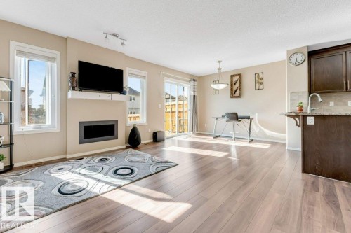 2912 15 Street Nw, Edmonton, AB - Indoor Photo Showing Kitchen With Fireplace