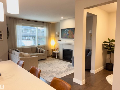 152 Sturtz Bend, Leduc, AB - Indoor Photo Showing Other Room With Fireplace