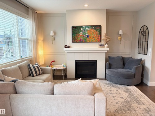 152 Sturtz Bend, Leduc, AB - Indoor Photo Showing Living Room With Fireplace