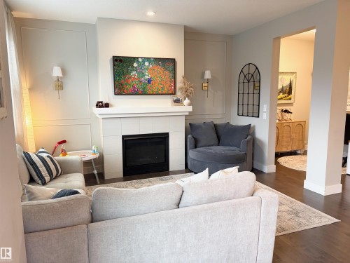 152 Sturtz Bend, Leduc, AB - Indoor Photo Showing Living Room With Fireplace