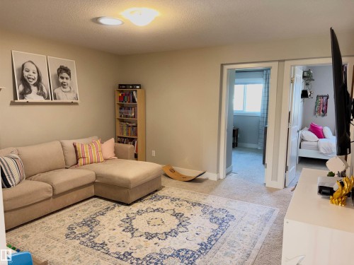 152 Sturtz Bend, Leduc, AB - Indoor Photo Showing Living Room