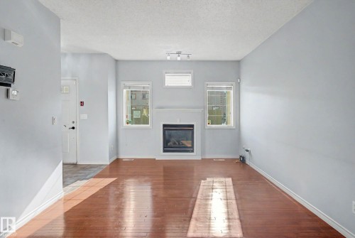 #47 13825 155 Av Nw, Edmonton, AB - Indoor With Fireplace