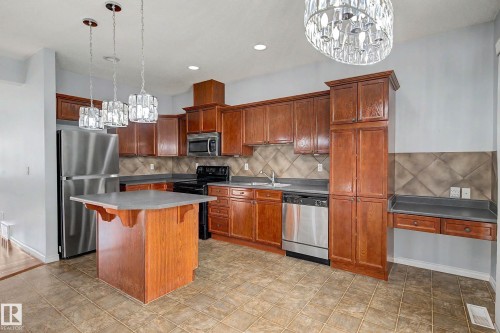 #47 13825 155 Av Nw, Edmonton, AB - Indoor Photo Showing Kitchen With Double Sink