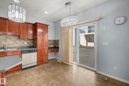 #47 13825 155 Av Nw, Edmonton, AB - Indoor Photo Showing Kitchen With Double Sink