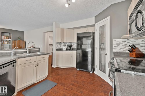 9 Landon Drive, Spruce Grove, AB - Indoor Photo Showing Kitchen With Double Sink