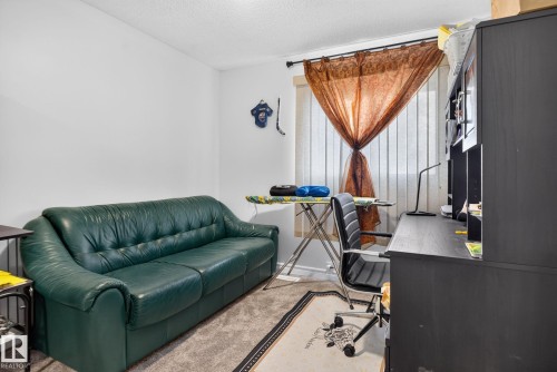 Room featuring white walls and textured ceiling - 1344 Lakewood Road West Nw, Edmonton, AB - Indoor