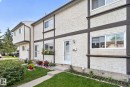 Stucco exterior with decorative dark trim - 1344 Lakewood Road West Nw, Edmonton, AB  - Outdoor 