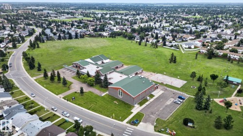Aerial perspective showcasing a residential area with a large green space - 1344 Lakewood Road West Nw, Edmonton, AB - Outdoor With View