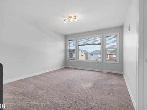 428 Simpkins Link, Leduc, AB - Indoor Photo Showing Other Room
