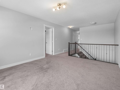 428 Simpkins Link, Leduc, AB - Indoor Photo Showing Other Room