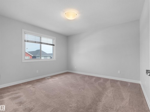 428 Simpkins Link, Leduc, AB - Indoor Photo Showing Other Room