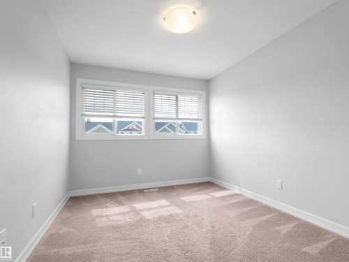 428 Simpkins Link, Leduc, AB - Indoor Photo Showing Other Room