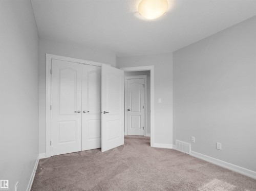 428 Simpkins Link, Leduc, AB - Indoor Photo Showing Other Room