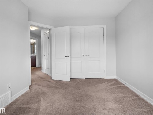 428 Simpkins Link, Leduc, AB - Indoor Photo Showing Other Room