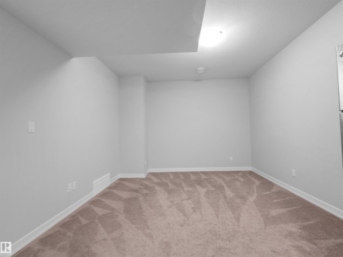 428 Simpkins Link, Leduc, AB - Indoor Photo Showing Other Room