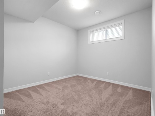 428 Simpkins Link, Leduc, AB - Indoor Photo Showing Other Room