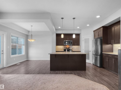 428 Simpkins Link, Leduc, AB - Indoor Photo Showing Kitchen With Upgraded Kitchen
