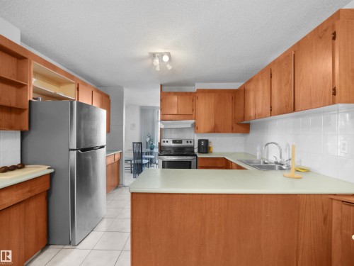 #701 11710 100 Av Nw, Edmonton, AB - Indoor Photo Showing Kitchen With Double Sink