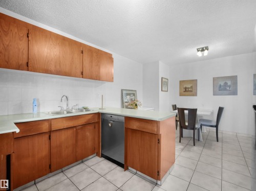 #701 11710 100 Av Nw, Edmonton, AB - Indoor Photo Showing Kitchen With Double Sink