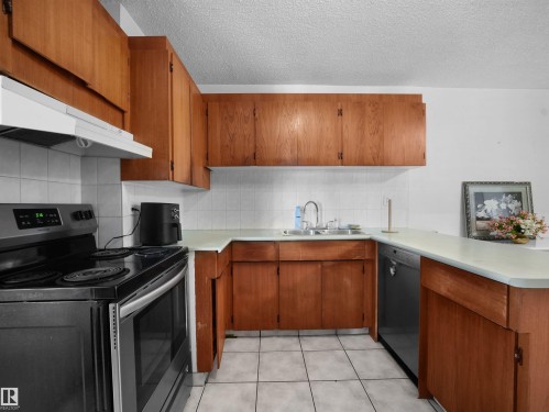 #701 11710 100 Av Nw, Edmonton, AB - Indoor Photo Showing Kitchen With Double Sink