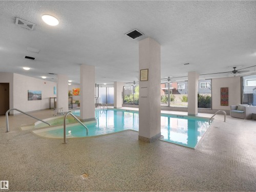 #701 11710 100 Av Nw, Edmonton, AB - Indoor Photo Showing Other Room With In Ground Pool