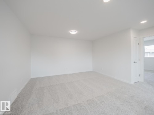 2 Elis Link, Spruce Grove, AB - Indoor Photo Showing Other Room