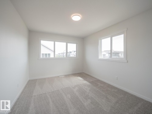 2 Elis Link, Spruce Grove, AB - Indoor Photo Showing Other Room