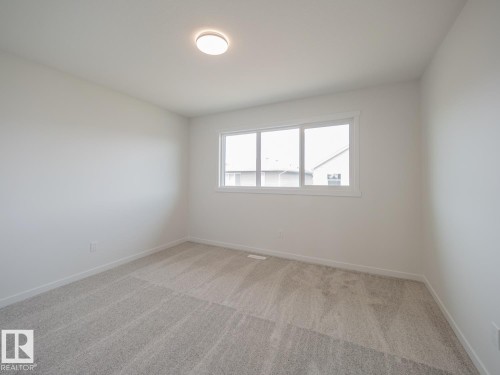 2 Elis Link, Spruce Grove, AB - Indoor Photo Showing Other Room
