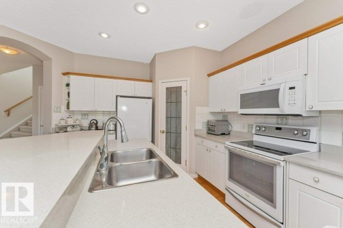 1072 Barnes Way Sw, Edmonton, AB - Indoor Photo Showing Kitchen With Double Sink