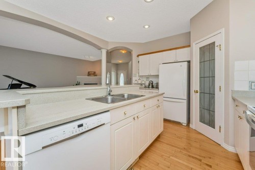 1072 Barnes Way Sw, Edmonton, AB - Indoor Photo Showing Kitchen With Double Sink