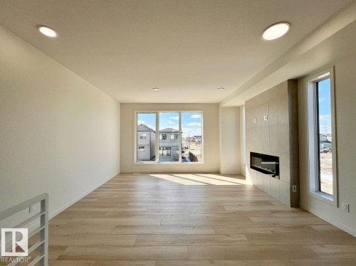 124 Westwind Drive, Spruce Grove, AB - Indoor With Fireplace