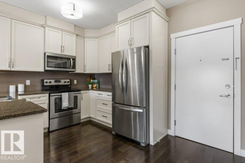 #409 2207 44 Av Nw, Edmonton, AB - Indoor Photo Showing Kitchen With Upgraded Kitchen
