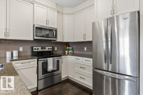 #409 2207 44 Av Nw, Edmonton, AB - Indoor Photo Showing Kitchen With Upgraded Kitchen