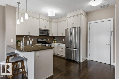 #409 2207 44 Av Nw, Edmonton, AB - Indoor Photo Showing Kitchen With Upgraded Kitchen